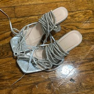 Strap up silver rhinestone bow with 5 center diamonds heels!